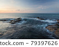 Waves and rocks shore long exposure 79397626