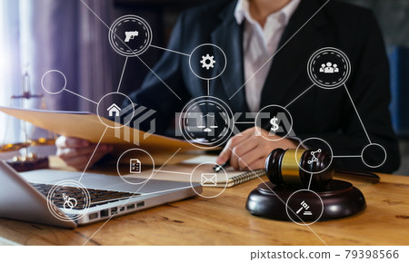 justice and law concept.Male judge in a courtroom the gavel, working with smart phone and laptop and digital tablet computer on wood table with VR icon justice and law concept.Male judge in a courtroom the gavel, working with smart phone and laptop and digital tablet computer on wood table with VR icon 79398566