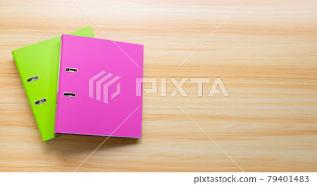 Office folders on wooden table texture background. Top view 79401483