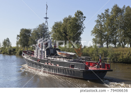 Corporate work boat "Swan" goes according Belozersky channel in the Vologda region Corporate work boat "Swan" goes according Belozersky channel in the Vologda region 79406636