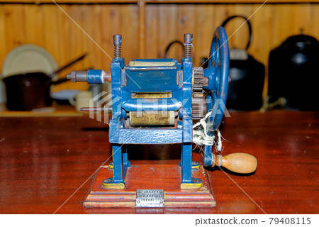 Vintage old machine for making homemade pasta or spaghetti Vintage old machine for making homemade pasta or spaghetti 79408115