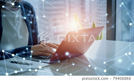 Network image A woman who uses a personal computer in the office Network image A woman who uses a personal computer in the office 79408868