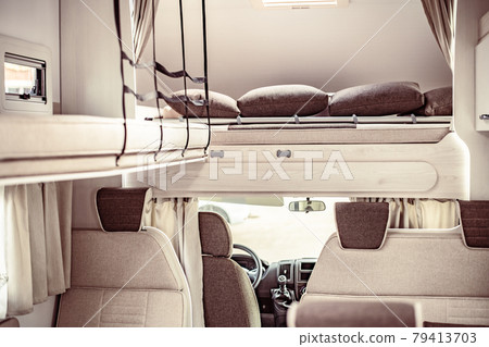Trailer or car house on wheels in an mobile home. Interior inside table and armchairs 79413703