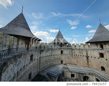 Soroca Fortress view from inside. Ancient military fort, historical landmark located in Moldova. Old stone walls fortifications, towers and bastions of medieval citadel 79415257