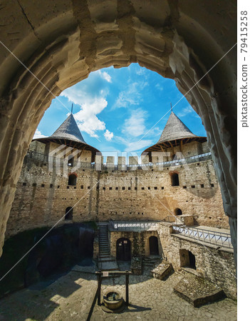 Soroca Fortress view from inside. Ancient military fort, historical landmark located in Moldova. Old stone walls fortifications, towers and bastions of medieval citadel 79415258