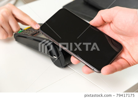 Contactless payment using smartphone by POS payment terminal 79417175