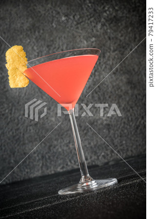 Glass of Cosmopolitan cocktail 79417233