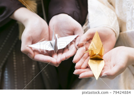Wedding image of a couple with paper cranes 79424884