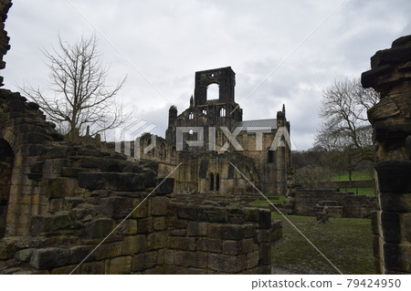 Beautiful landscape of the Kirkstall Abbey ruins, Leeds, England; taken in a rainy day of 2 April 2018 79424950
