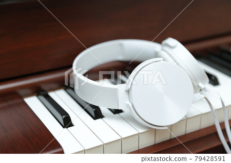 Upright piano with deals headphones