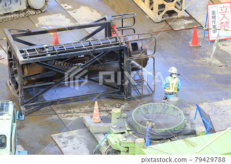 Construction site foundation work bucket and bucket stand Construction site foundation work bucket and bucket stand 79429788