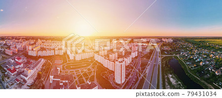 Aerial view of city residential district at sunset, panorama 79431034