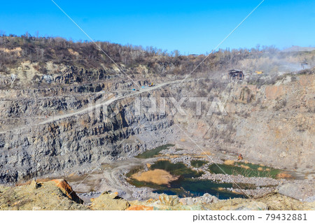 View of granite quarry. Pumping groundwater from quarry 79432881