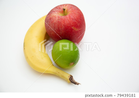 Close up shot of banana , apple and lemon isolated on white background Close up shot of banana , apple and lemon isolated on white background 79439181