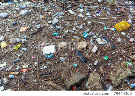 Garbage floating on the water surface Environmental problem Garbage floating on the water surface Environmental problem 79444360