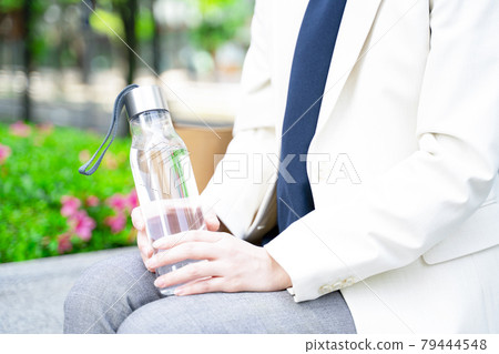 Women supplementing hydration Women supplementing hydration 79444548