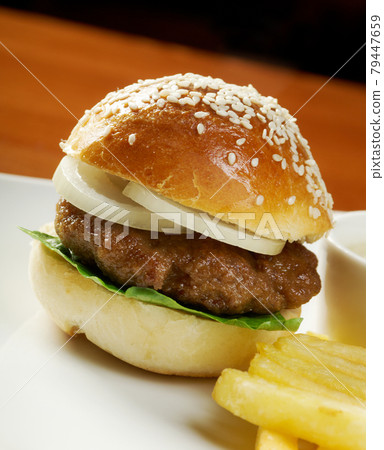 Hamburger with french fries 79447659