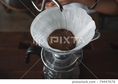 barista dripping coffee and slow coffee bar style 79447678