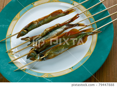 grilled fish on a stick grilled fish on a stick 79447888