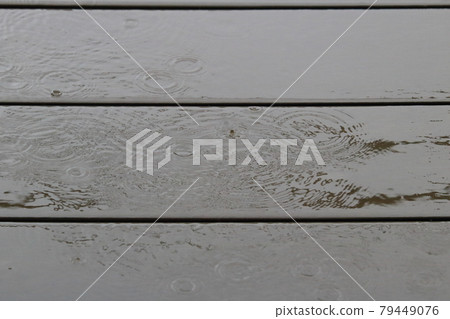 Rain on the wooden deck 79449076