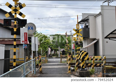 Railroad crossing in the alley 79452024