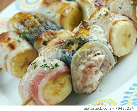 kebabs mackerel, banana and bacon 79453254