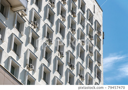 Old Soviet architecture. Straight lines and gray hotel building Soviet in Kolomna, Russia 79457470