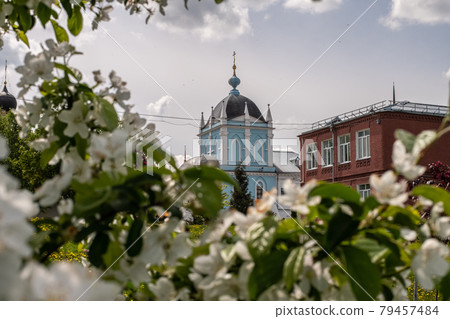 Womens Monastery and school on Cathedral Square beautiful defocus floral background. Womens Monastery and school on Cathedral Square beautiful defocus floral background. 79457484