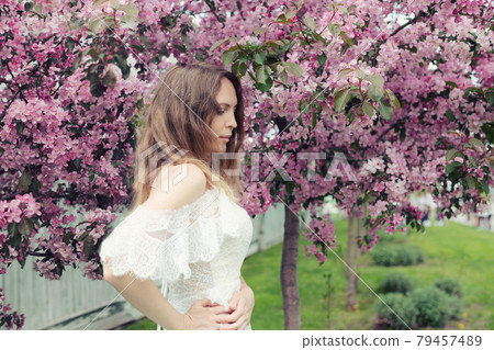 Beautiful young adult woman model Posing in a Beautiful young adult woman model Posing in a 79457489