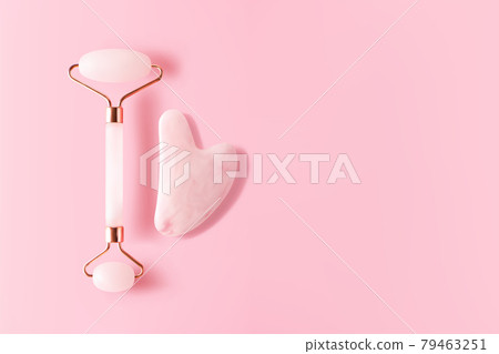 Quartz facial massager and gua sha on pink background with copy space banner format, top view. Trendy skincare facial massager tools 3d vector realistic illustration Quartz facial massager and gua sha on pink background with copy space banner format, top view. Trendy skincare facial massager tools 3d vector realistic illustration 79463251