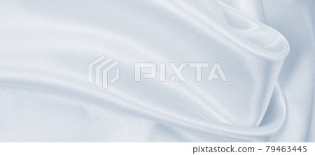 Smooth elegant grey silk or satin luxury cloth as wedding background. Luxurious background design Smooth elegant grey silk or satin luxury cloth as wedding background. Luxurious background design 79463445