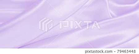 Smooth elegant lilac silk or satin texture as wedding background. Luxurious background design Smooth elegant lilac silk or satin texture as wedding background. Luxurious background design 79463448