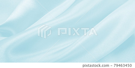 Smooth elegant blue silk or satin luxury cloth texture as abstract background. Luxurious background design Smooth elegant blue silk or satin luxury cloth texture as abstract background. Luxurious background design 79463450