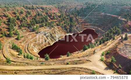 Acidic red lake in open pit of abandoned Kokkinopezoula copper mine in Mitsero, Cyprus Acidic red lake in open pit of abandoned Kokkinopezoula copper mine in Mitsero, Cyprus 79465878