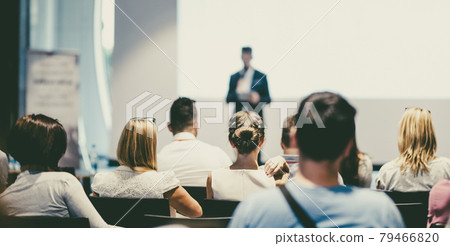Male business speaker giving a talk at business conference event. Male business speaker giving a talk at business conference event. 79466820
