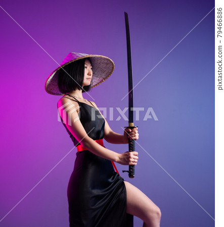 slender Asian woman an Asian hat with a katana in her hand image of a samurai slender Asian woman an Asian hat with a katana in her hand image of a samurai 79466886