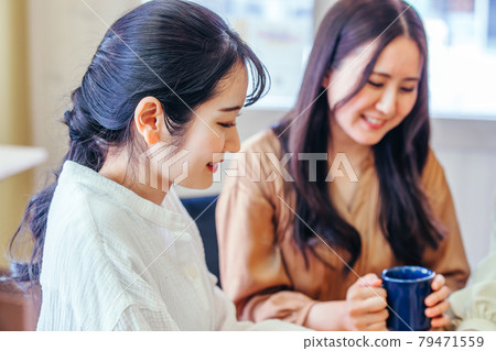 Women having a girls-only gathering, lunch, and dinner Women having a girls-only gathering, lunch, and dinner 79471559
