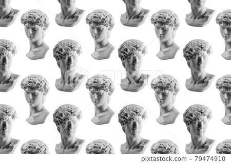 Pattern from gypsum statue of David's head. Michelangelo's David statue plaster copy isolated on white background. Ancient greek sculpture, statue of hero. 79474910