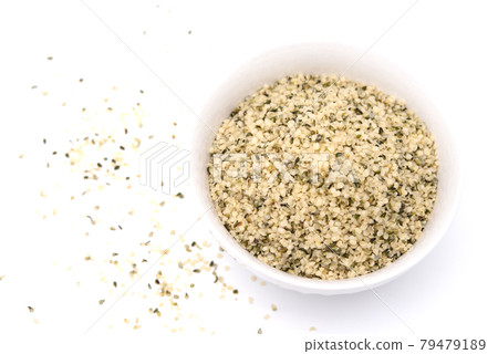 Organic shelled hemp seeds isolated on white background. 79479189