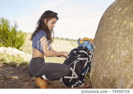 Female Enjoying Relaxing in mountain trekking 79480726