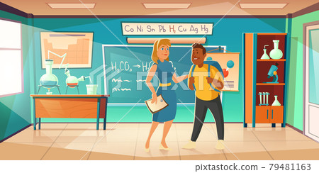 Teacher greeting student in chemistry classroom 79481163