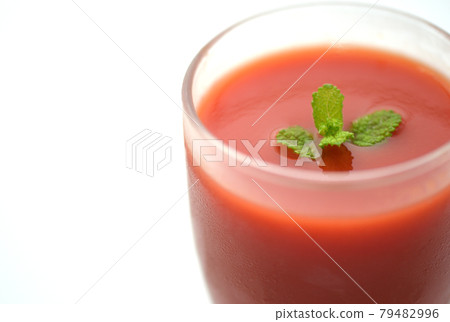 Up from the top of tomato juice in a glass cup Up from the top of tomato juice in a glass cup 79482996