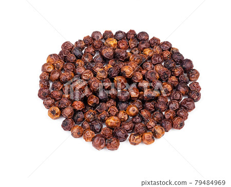 pile of dried red Kampot pepper closeup on white pile of dried red Kampot pepper closeup on white 79484969