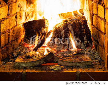 burning woods in hearth burning woods in hearth 79485137