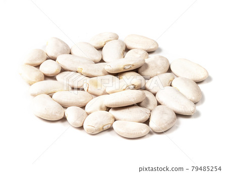 handful of lima beans closeup on white 79485254