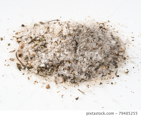 handful of adyghe seasoned salt closeup on white 79485255