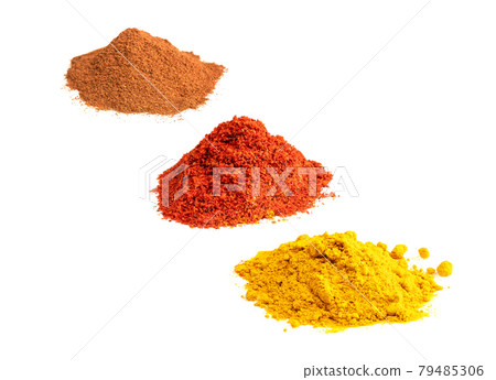 brown, red and yellow spices on white brown, red and yellow spices on white 79485306