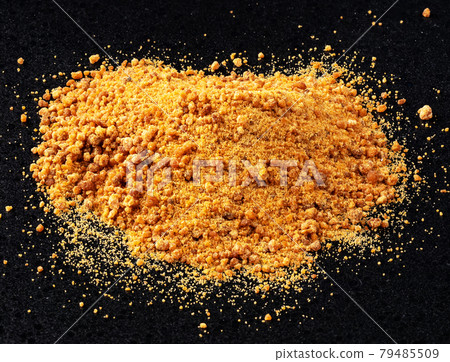 handful of dark coconut blossom sugar on black handful of dark coconut blossom sugar on black 79485509