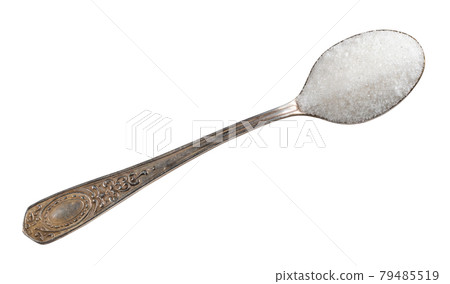 refined white sugar in silver teaspoon cutout 79485519