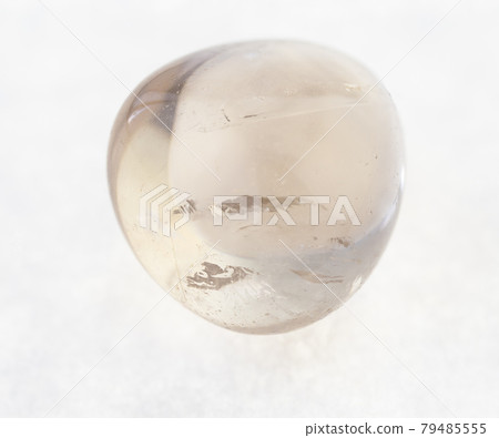 tumbled Smoky quartz gemstone on white 79485555